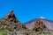 Teide - Rock formation hillock Roque del Peral with scenic view on volcano Pico del Teide, Mount El Teide National Park,