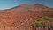 Teide volcano Canary Islands. Volcanic landscape. Red stone rock and peak hill in the background. It can be used to