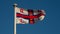 Teignmouth, UK - August 20 2020: RNLI flag waving in the wind