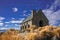 Tekapo, New Zealand. Old stone church with mountain and blue sky background