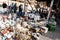 Tel Aviv, Israel - September 12, 2011: People buy old antique dishes at the flea market in the old city of Jaffa, Tel Aviv, Israel