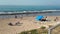 Tel Aviv, Israel . Unknown men and women on the Tel Baruch beach , favorite vacation place for local people