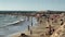 Tel Aviv, Israel. Unknown men and women on the Tel Baruch beach , favorite vacation place for local people