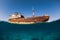 Telamon wreck ship in blue ocean. Split shot. Lanzarote