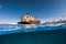 Telamon wreck ship in blue ocean. Split view. Lanzarote