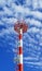 Telecom tower on blue sky background