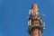 Telecommunication antennas on an old brick chimney. Industrial concept. Modern technology. Cell tower