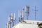 Telecommunication base stations network repeaters on the roof of