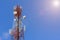 Telecommunication, Cellular or Radio antenna tower in blue sky.