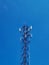 The telecommunication network tower looks so beautiful. Take a picture when the weather is clear and the sky is blue