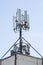 Telecommunication tower with antennas and transmitters on the roof