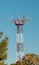Telecommunication Tower. Cellular mobile radio transmission pole tower on the blue sky