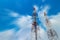 Telecommunication Tower. Mobile Phone Signal Tower on blue sky blury background landscape