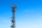 Telecommunication tower phone networkon on blue sky  right space