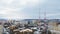 Telecommunication towers in modern city in winter day and cityscape from top