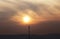 Telecommunication transmission tower with beautiful sunset