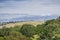 Telecommunications antenna on top of green hills, San Francisco bay, California