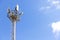 Telecommunications equipment, cell tower, directional mobile phone antenna dishes. Wireless communication
