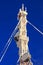 Telecommunications mast on a blue background