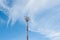 Telecommunications pole with nice cloud