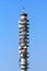 Telecommunications repeater tower with dishes
