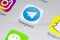 Telegram application icon on Apple iPhone X screen close-up. Telegram app icon. Telegram is an online social media network. Social