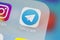 Telegram application icon on Apple iPhone X screen close-up. Telegram app icon. Telegram is an online social media network. Social