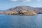 Telegraph Island off Khasab, Musandam, Oman in the Fjords near Strait of Hormuz. British telegraph lines still present. Blue sky