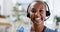 Telemarketing, face and happy black woman with a smile from customer support work. Call centre, crm and web help