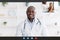 Telemedicine. Black woman having video call with pediatrician