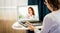 telemedicine concept elderly woman using laptop and taking her blood pressure