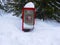 A telephone booth in the snow