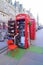 Telephone box shop on city street