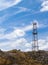 Telephone Mast and Mud with Blue Sky