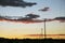 Telephone polls at sunset, Interstate 10, near Palm Springs, California, USA