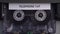 Telephone Tap Audio Recording on Vintage Cassette Playing in Deck Player, Close