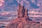 Telephoto portrait of candlestick tower at Canyonlands during sunset
