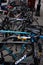 Telephoto view of a row of bicycles locked up to outdoor bike parking rails