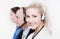 Telesales or helpdesk team - helpful woman with headset smling a
