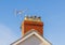 A television aerial on a chimney stack. Wales. UK