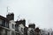 Television antennas and chimneys on roof