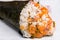 Temaki, nori seaweed cone stuffed with rice, salmon and caviar accompanied by wasabi and gari