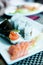 Temaki sushi, sushi, salmon and wasabi on a plate