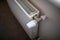 Temperature knob of heating radiator at home