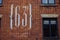 Temperature sign drown on a building in Manchester, England