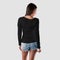Template of black stylish clothes with long sleeves on a young girl, back view, for presentation of design, logo