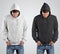 Template fashion mockup white and black hoodie on a man, isolated on background, front view