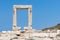 Temple of Apollo ancient ruins in Naxos island, Cyclades, Greece. Famous landmark of Portara in Chora Town.