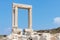 Temple of Apollo ancient ruins in Naxos island, Cyclades, Greece. Famous landmark of Portara in Chora Town.