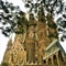 The Temple Expiatori de la Sagrada FamÃ­lia and trees in Barcelona city, Spain